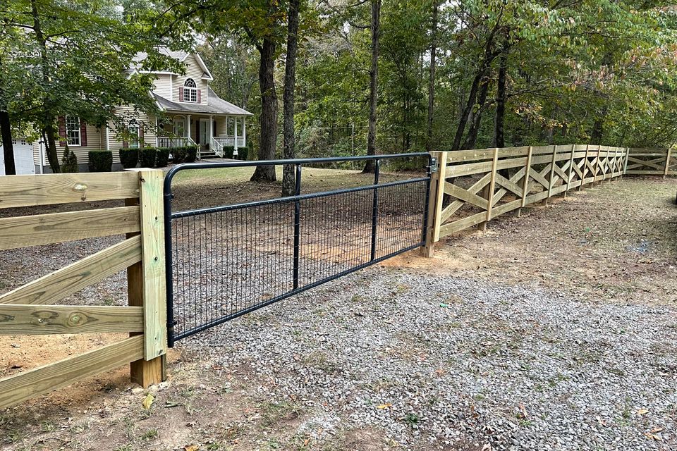 Wooden rail fence marking the boundary of a country property